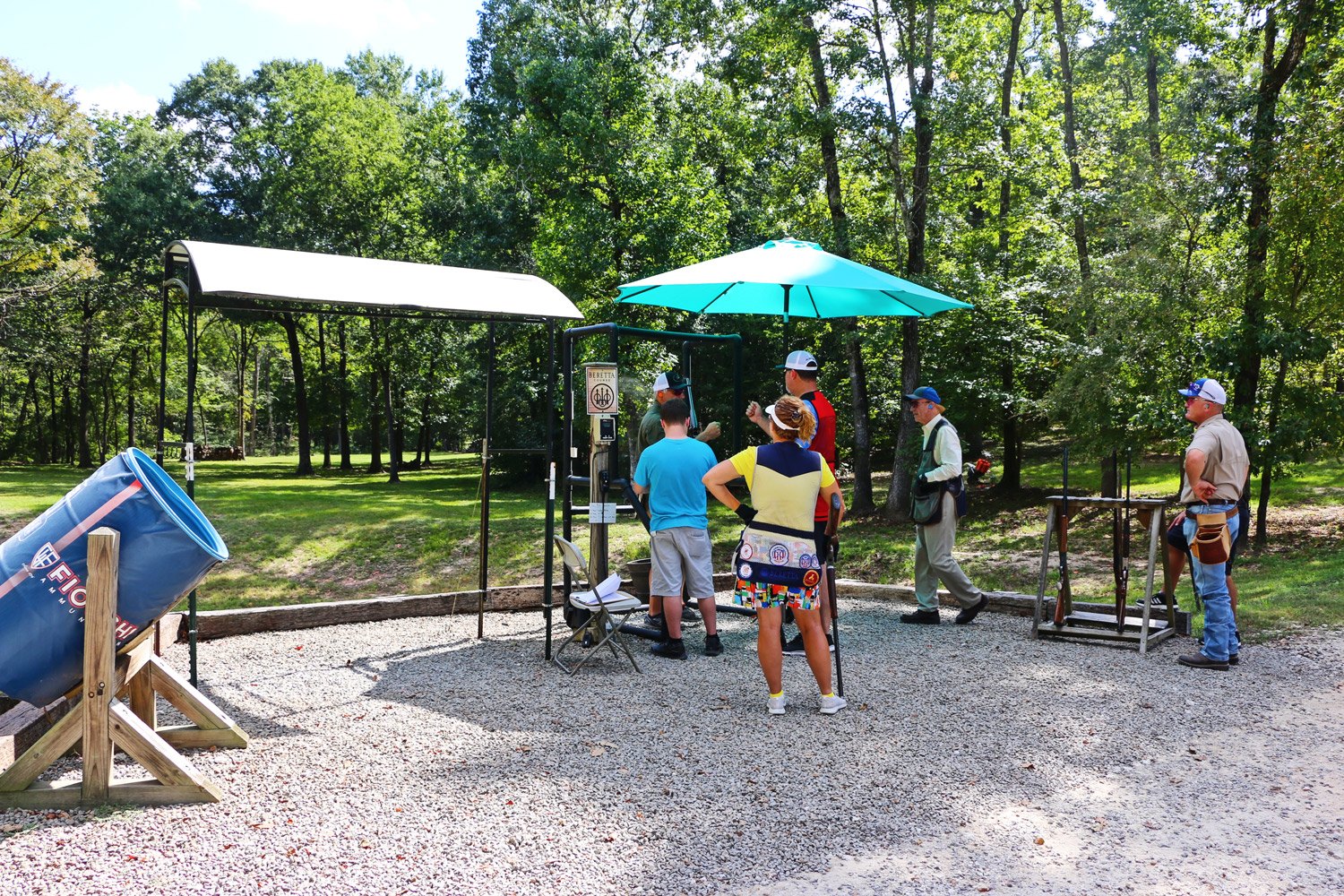 Shooters gathered at a station on the Beretta sporting clay course